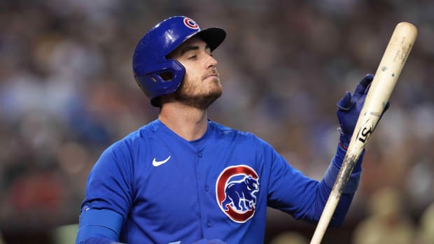 Sep 16, 2023; Phoenix, Arizona, USA; Chicago Cubs first baseman Cody Bellinger (24) reacts after striking out against the Arizona Diamondbacks during the fourth inning at Chase Field. Mandatory Credit: Joe Camporeale-USA TODAY Sports